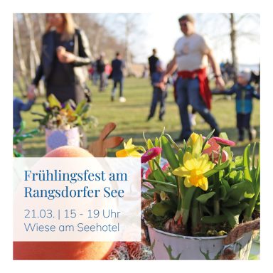 Frühlingsfest am Rangsdofer See mit Blumen und Menschen im Hintergrund.